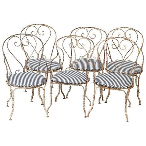 A set of six French Antique Wrought Iron garden chairs ...