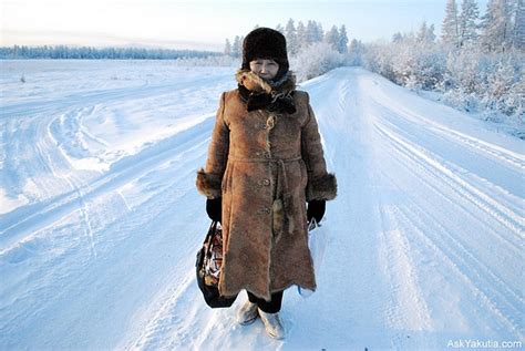 A woman in national cold weather gears. Oymyakon, Yakutia ...