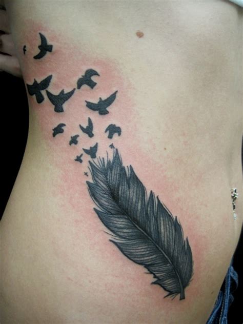 afrenchieforyourthoughts: Getting feather tattoos on ribs