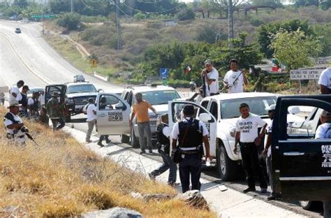 Armed vigilante groups policing 2 mexican towns ...