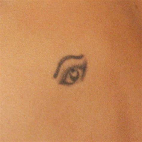 Asia Argento Eye Upper Back Tattoo | Steal Her Style