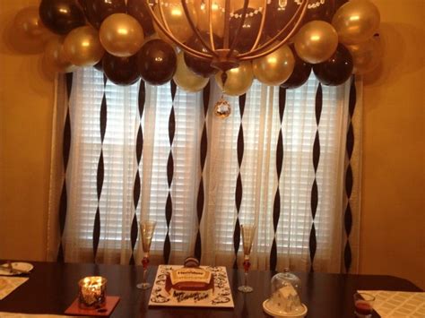 Balloon and Streamers: Balloon backdrop using black & gold ...