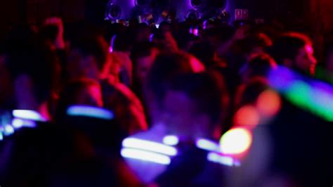 Barcelona night disco dance party fiesta. People dancing ...