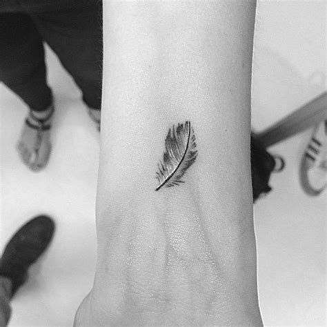 Best 25+ Feather tattoo wrist ideas on Pinterest | Feather ...