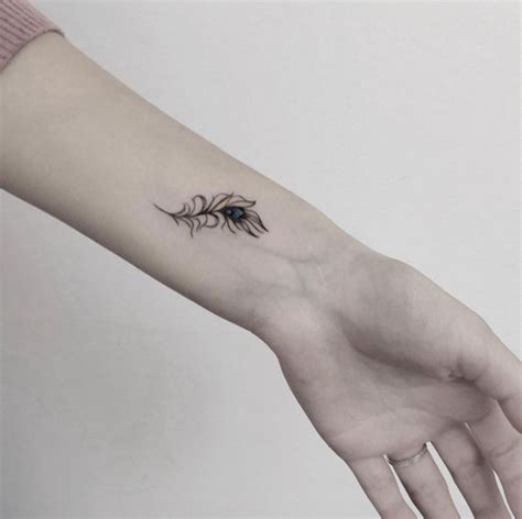 Best 25+ Peacock feather tattoo ideas on Pinterest