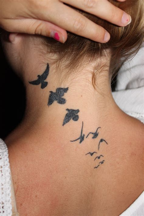Birds Flying Away Tattoo On Arm Flying bird tattoo on arm ...