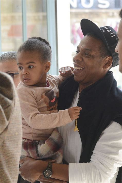 Blue Ivy clutches tiny Eiffel Tower as she leaves Paris ...