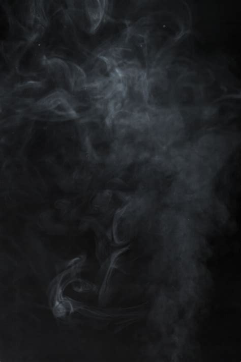 Blurred smoke on black background Photo | Free Download