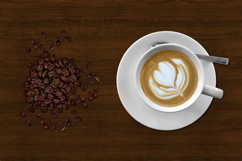 Brown and White Espresso in White Coffee Mug Beside Coffee ...