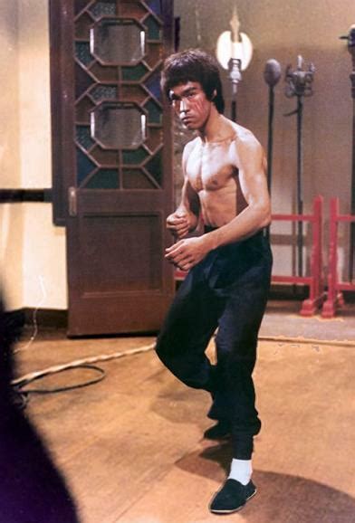 Bruce Lee in his  Enter the Dragon  movie in 1973 ...