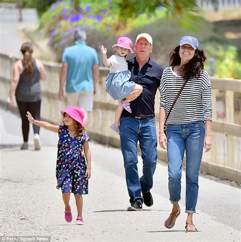Bruce Willis enjoys a fun day at Disneyland with family ...