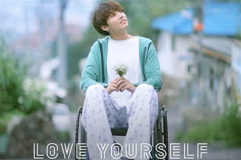 BTS  Jungkook is a man with flowers in  Love Yourself  poster
