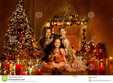 Christmas Family In Decorated Home Room, Christmas Tree ...