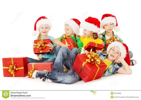 Christmas Helpers Kids In Santa Hat Holding Presen Stock ...