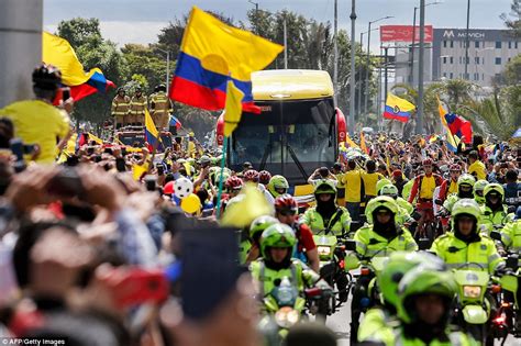 Colombian football team arrives home flanked by scores of ...