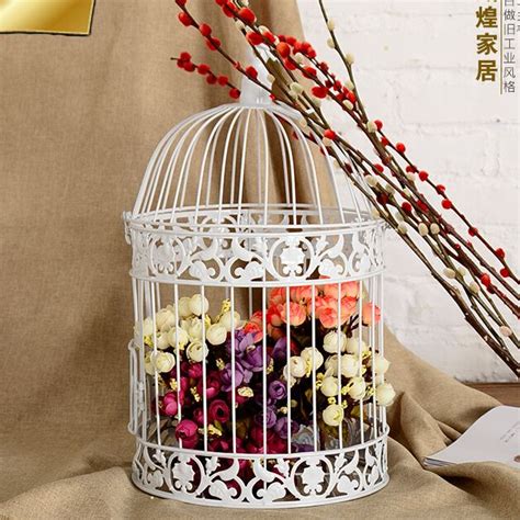 Compra decorativas jaulas de hierro de aves online al por ...