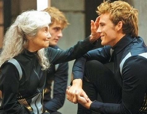 CUTE STILL of Mags & Finnick in THE HUNGER GAMES: CATCHING ...