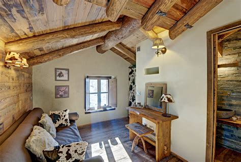 Diseño de interiores rústico uso de madera y piedra