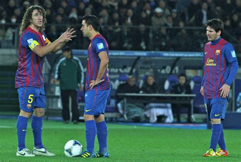 File:Puyol Xavi Messi FC Barcelona Team of the Year 2011 ...