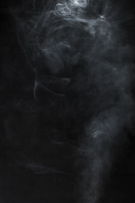 Fondo negro con humo difuminado | Descargar Fotos gratis
