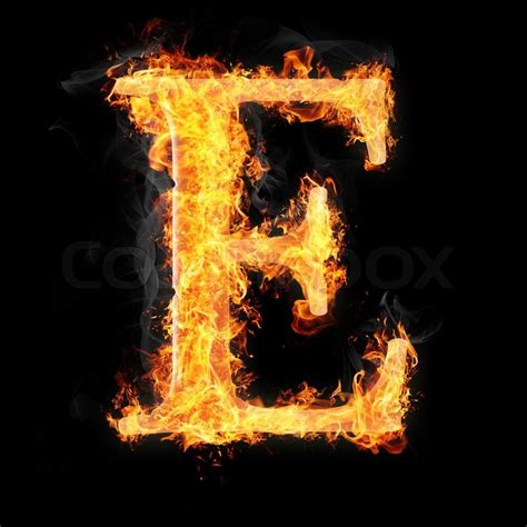 Fonts and symbols in fire on black background for ...
