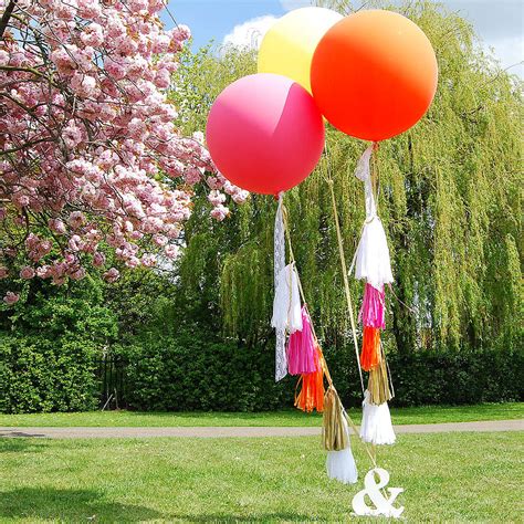 giant round tasselled balloons by eagle eyed bride ...