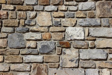 Gray Brown and Black Brick Stone Wall · Free Stock Photo