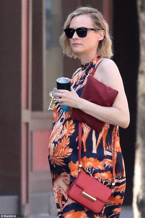 Heavily pregnant Diane Kruger wears safari dress for ...
