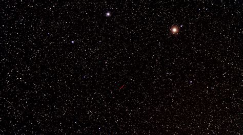 Imagen  GIF  de Plutón moviéndose entre las estrellas de ...