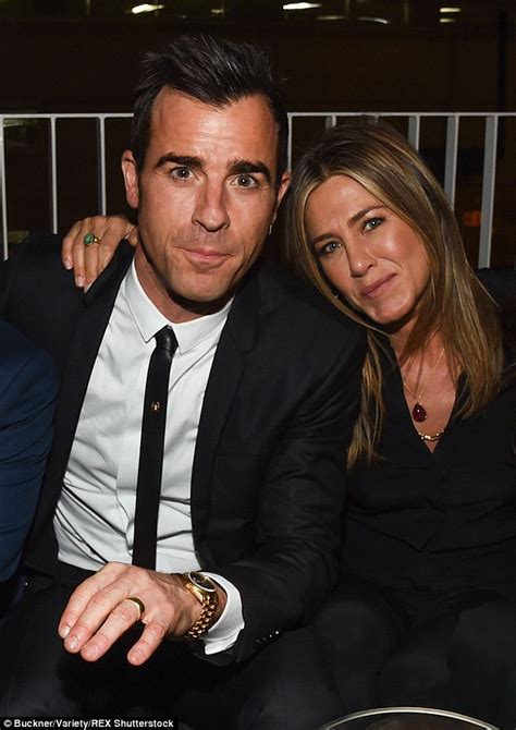 Jennifer Aniston snuggles up to Justin Theroux at The ...