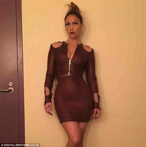 Jennifer Lopez flashes flesh on her way to judge American ...