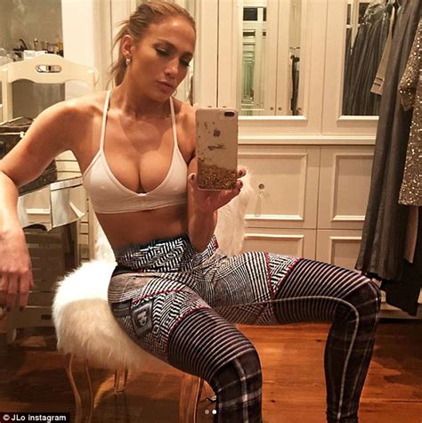 Jennifer Lopez flaunts her midriff and legs in patterned ...