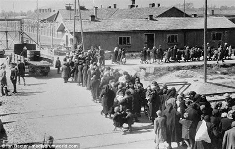 Jewish women and children queue up at Auschwitz Birkenau ...