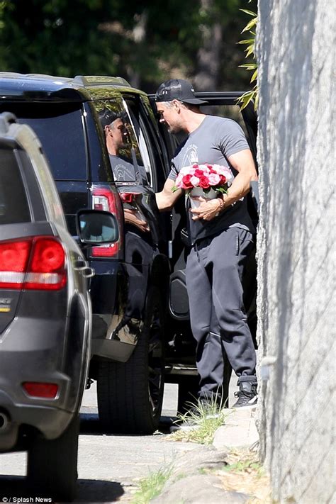 Josh Duhamel takes Fergie flowers after National Anthem ...
