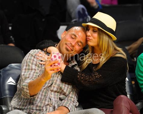 Kaley Cuoco and Bret Bollinger attend a basketball game ...