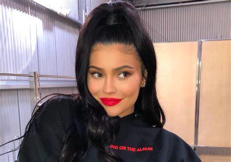 Kylie Jenner Posed In Track Pants and Cropped Sweatshirt ...