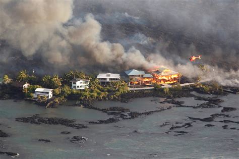 La lava del volcán Kilauea destruye cientos de casas en ...