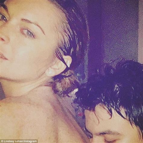 Lindsay Lohan flaunts her figure while fishing for her ...