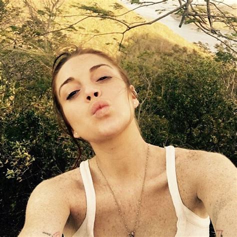 Lindsay Lohan teases fans with a very raunchy topless ...