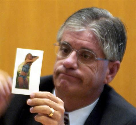 Lt. Ken Landwehr shows a picture of a young girl during ...