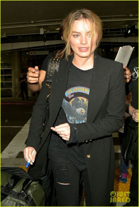 Margot Robbie & Boyfriend Tom Ackerley Arrive at LAX ...