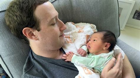 Mark Zuckerberg snuggles with baby daughter August in ...