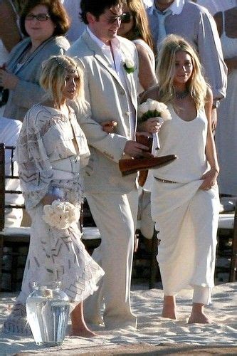 Mary Kate and Ashley Olsen at a beach wedding. # ...