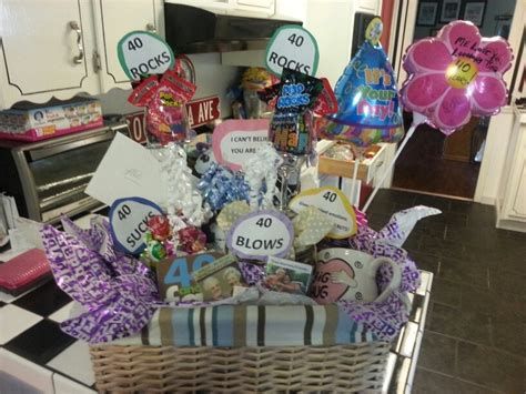Mel s 40th birthday gift basket.. 40 sucks.. container ...