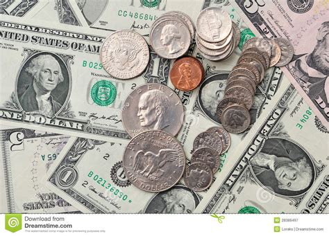 Monedas Y Billetes De Banco Del Dólar Como Fondo Imagen de ...