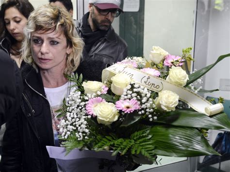 Mother of Murdered Girl Proudly Carries Flowers of Luca ...