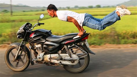 Motorbike Yoga: Man Pulls Yoga Poses On Speeding Bike ...