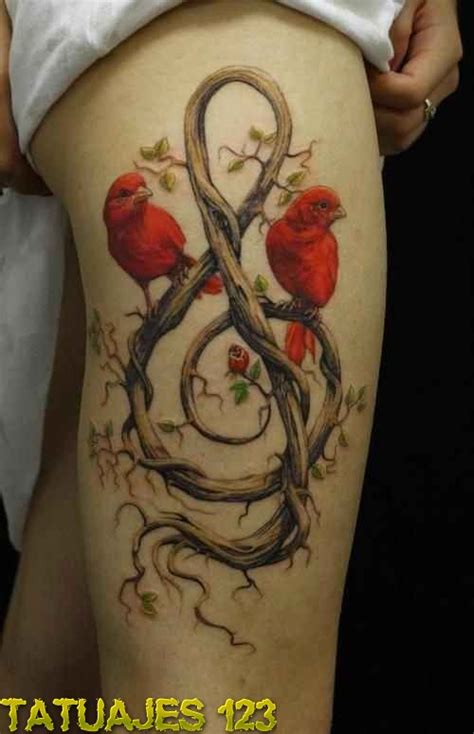 Nota musical con dos bonitos pájaros   Tatuajes 123