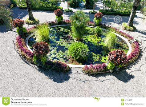 Ornamental Garden Pond With Water Plants And Flowers Stock ...