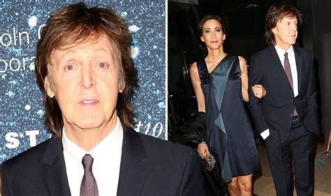Paul McCartney holds wife Nancy s hand at Stella s ...